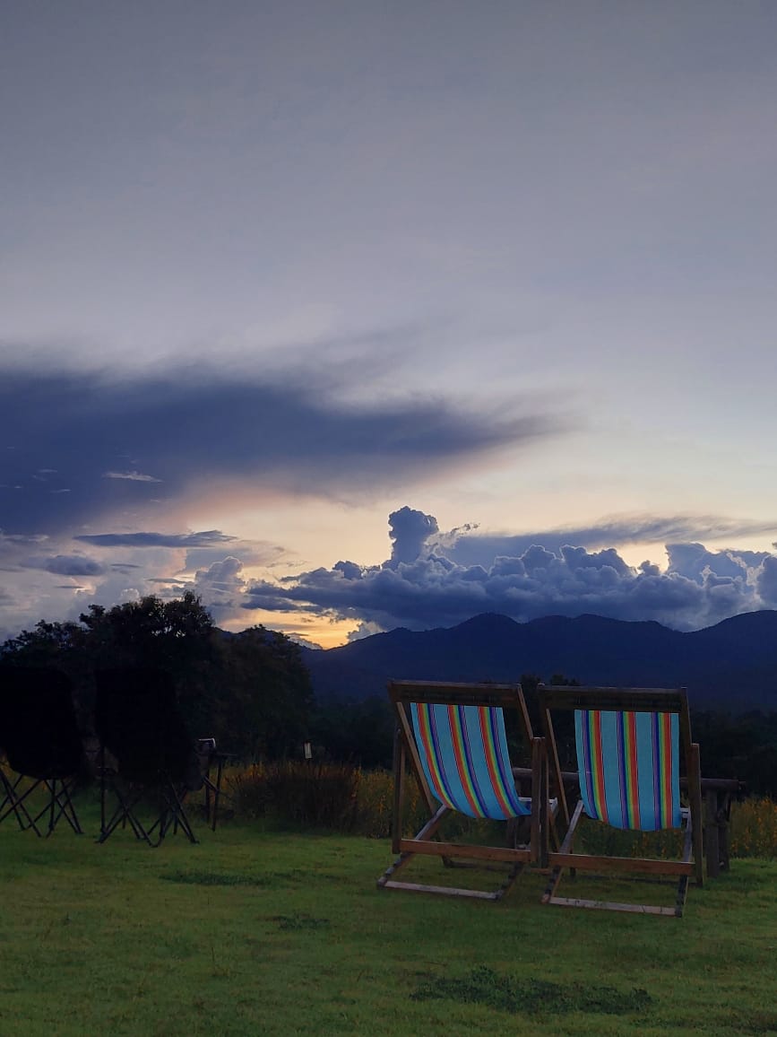 Watching beautiful Sunset over Thai Highlands in Pai.